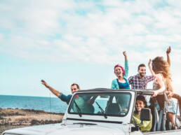 Jeep full of people waving